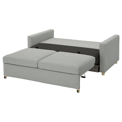 Grey SALTSJÖBADEN sofa-bed with gold legs, modern, recycled upholstery.