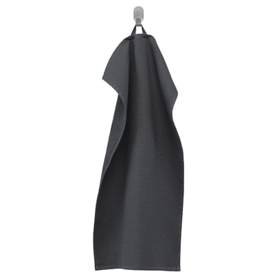 Dark grey SALVIKEN towel hanging, textured side out.