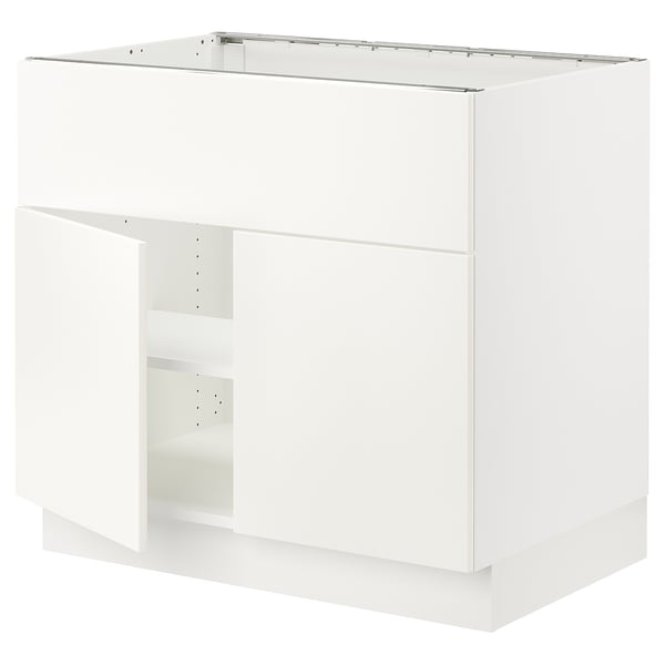 SEKTION white kitchen cabinet, minimalist design, smooth surfaces, square shape.