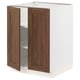 Open ikea SEKTION kitchen cabinet with white frame and walnut doors, displaying shelves inside.