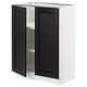 Black kitchen cabinet with white interior, bevelled black doors, and adjustable shelves.