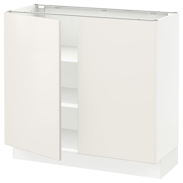 An ikea SEKTION kitchen cabinet in white with modern, smooth design and adjustable shelves.