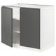 Modern grey ikea SEKTION kitchen cabinet with integrated handles and a white interior.