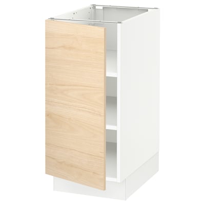 IKEAs SEKTION kitchen cabinet. Light ash wood, sleek design. Open hinge, adjustable shelves.