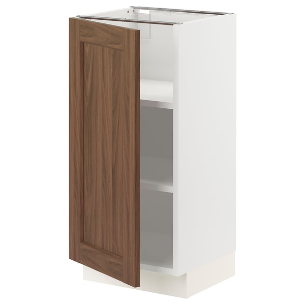This image shows an ikea SEKTION kitchen cabinet with a white frame and a walnut-brown door featuring a panel design.