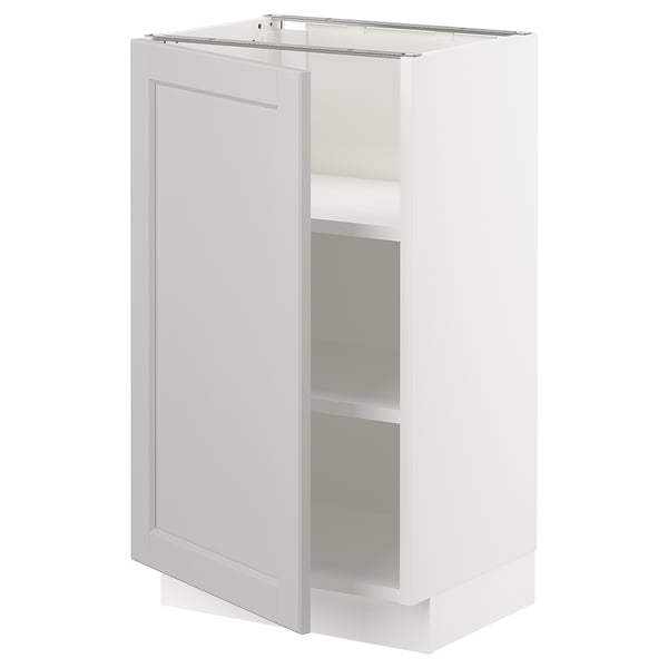 A white SEKTION kitchen cabinet with a grey lerhyttan door and adjustable shelf.