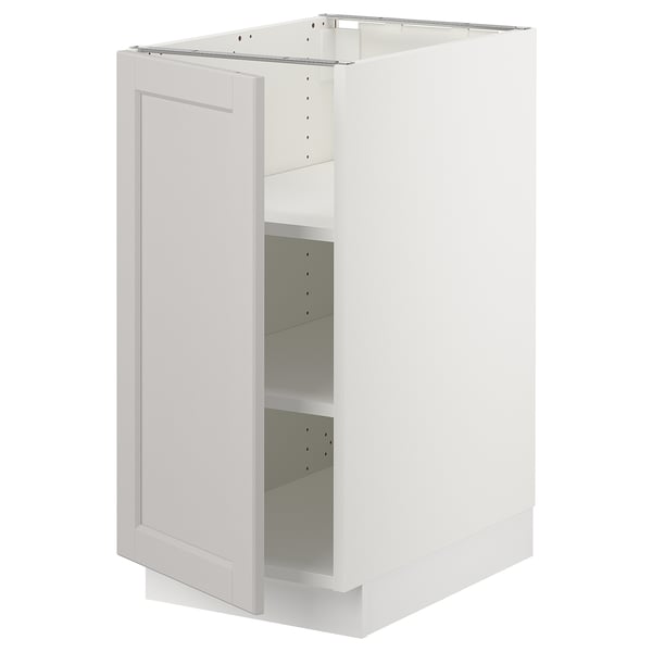 White SEKTION kitchen cabinet with left-opening door, bevelled edges, and adjustable shelves.
