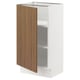 White SEKTION kitchen cabinet with walnut door, adjustable shelves, smooth surface.