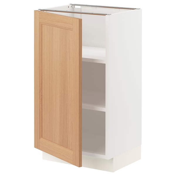 White cabinet with oak door, adjustable shelves, nickel hinges.