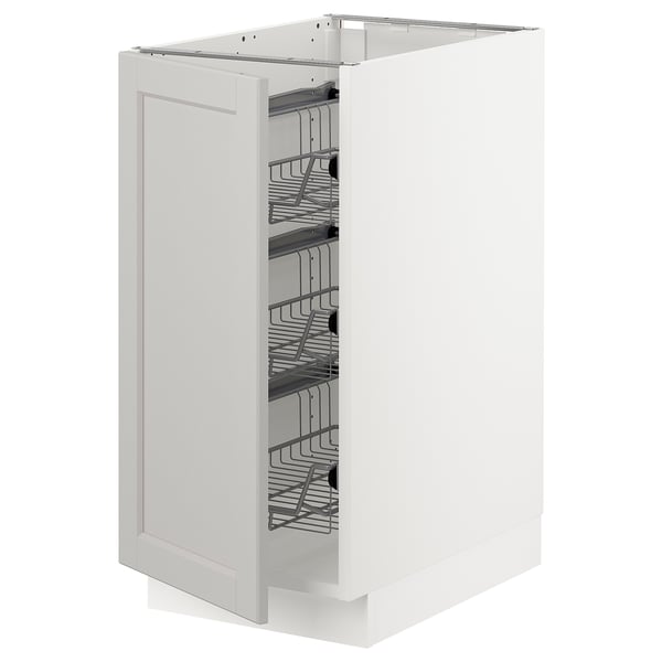 White SEKTION kitchen cabinet with pull-out wire baskets, bevelled doors.