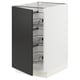 A white SEKTION kitchen cabinet with a matt black door and metal wire shelves.