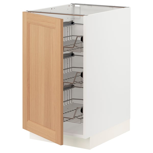SEKTION kitchen cabinet with oak door and metal shelves.