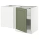 White and green kitchen cabinet with door open.