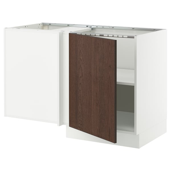 A white SEKTION kitchen cabinet with a dark brown sinarp wooden door, slightly ajar.