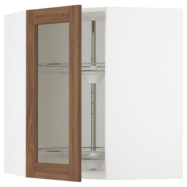 A white SEKTION kitchen cabinet with an open wooden-framed glass door displaying swivel shelves.