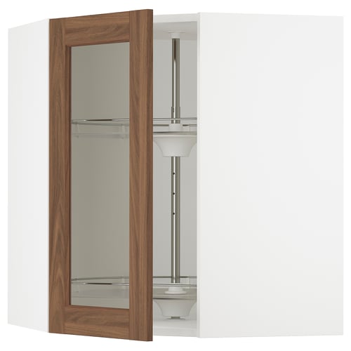 A white SEKTION kitchen cabinet with an open wooden-framed glass door displaying swivel shelves.