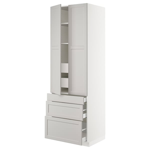 White SEKTION cabinet with classic design, drawers, shelves, and adjustable interior. Sturdy frame, smooth drawers.