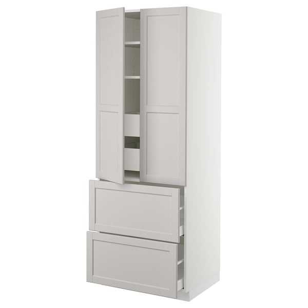 White SEKTION kitchen unit with drawers and shelves.