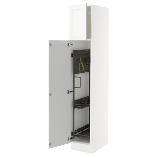 An ikea SEKTION white cabinet with adjustable shelves and a door that swings open.