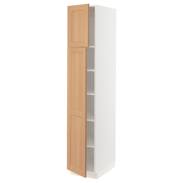 An oak ikea SEKTION kitchen cabinet with two adjustable shelves and a door in a natural wood finish.