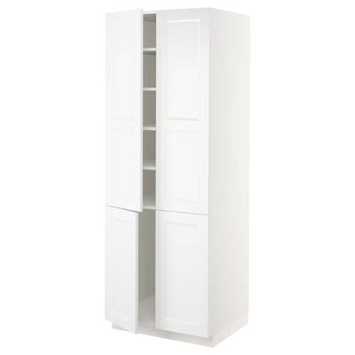 A white SEKTION tall kitchen cabinet with two open doors revealing adjustable shelves. The cabinet is sleek and rectangular with a modern design.