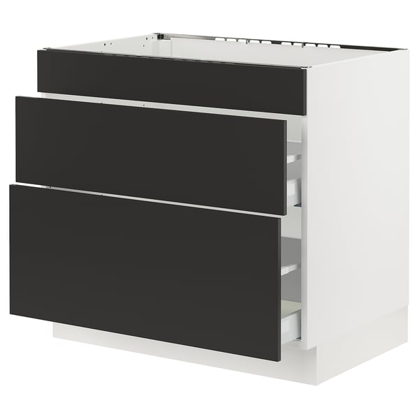 SEKTION kitchen cabinet in matte black with three drawers and white frame.