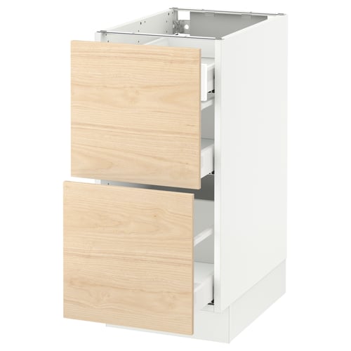 Ikea SEKTION kitchen cabinet in white with light ash wood drawers, two open drawers on the right, closed on the left.