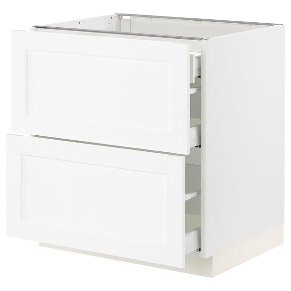 White SEKTION kitchen cabinet with pull-out drawers, modern design.