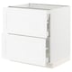 White SEKTION kitchen cabinet with pull-out drawers, modern design.
