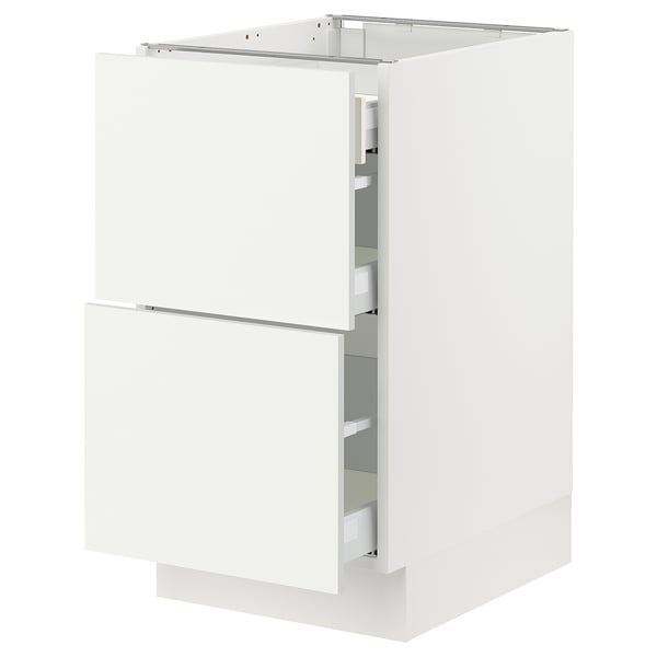SEKTION white kitchen cabinet with smooth drawer fronts and sleek design, featuring high-quality materials for durability and modern aesthetic appeal.