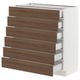 A SEKTION kitchen cabinet with walnut-colored drawers and white frame, designed with a modern and classic style.