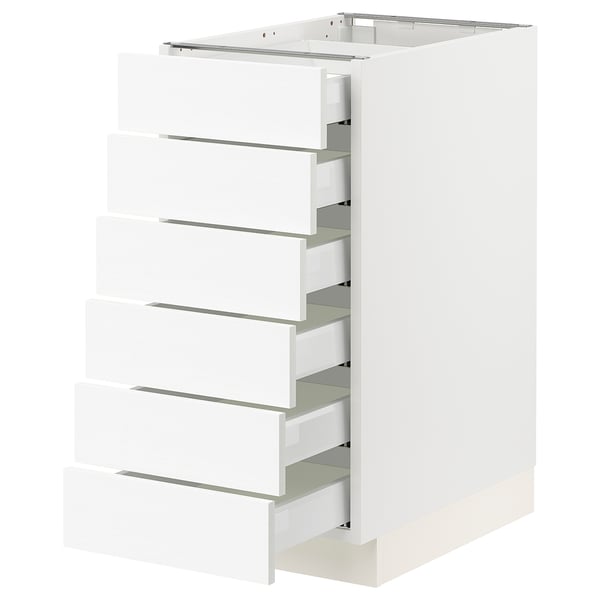 Ikea SEKTION white kitchen cabinet with multiple drawers; sleek, modern design.