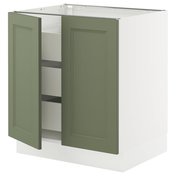 Ikea SEKTION kitchen cabinet in green with white base, open door showing shelves.
