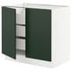 An open dark green ikea SEKTION kitchen cabinet with white interiors.