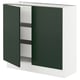SEKTION kitchen cabinet with dark green havstorp doors, white base, full-height.