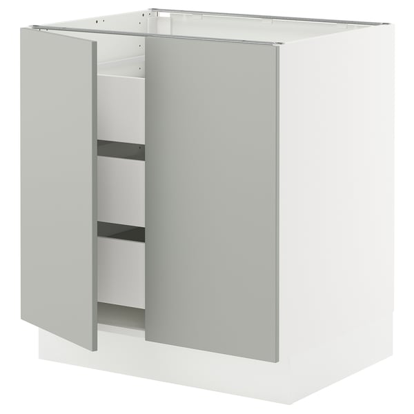 SEKTION kitchen cabinet in light grey with adjustable shelves and smooth drawers.