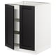SEKTION kitchen cabinet with black stained wood doors and white frame.