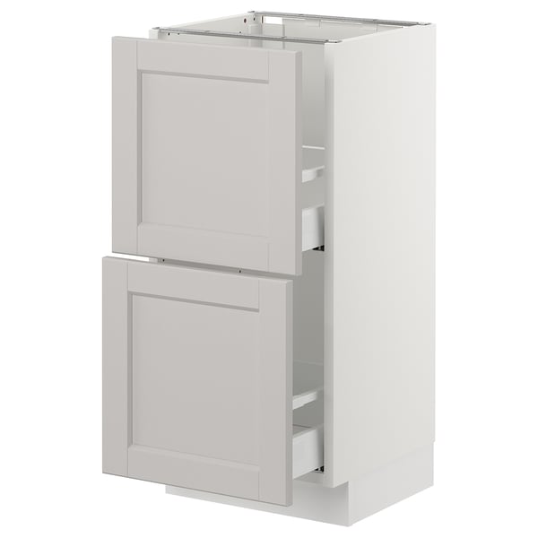 Ikea SEKTION light gray kitchen cabinet with drawers.