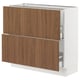 SEKTION kitchen unit with walnut wood effect doors. White frame, rectangular shape, modern design with smooth surfaces.