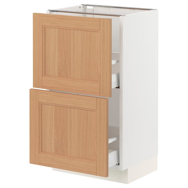 Ikea SEKTION white cabinet with oak drawers, wooden panel design.