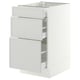 A white IKEA SEKTION kitchen base cabinet with three light grey drawers. Its modern, rectangular, and minimalist.