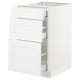 Ikea SEKTION white kitchen cabinet with pull-out drawers.