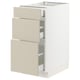 Ikea SEKTION kitchen cabinet with 3 beige havstorp drawers, smooth minimalist design.