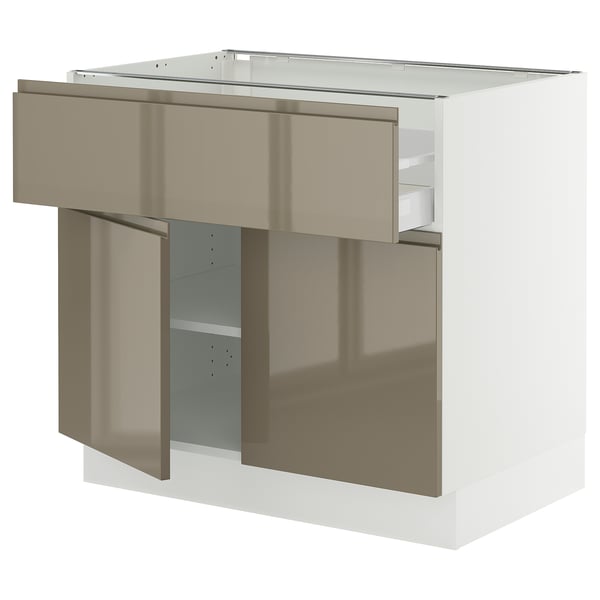 SEKTION kitchen cabinet in high gloss dark grey-brown with integrated handles, featuring a white base and metallic drawer.
