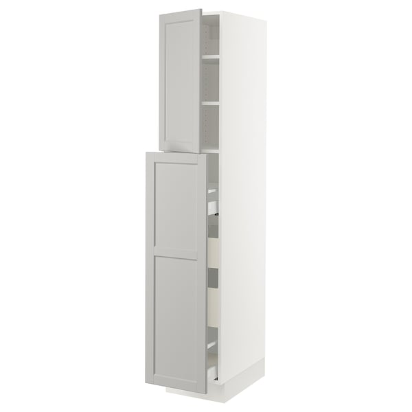 SEKTION white kitchen cabinet with adjustable shelves and bevelled light grey doors.