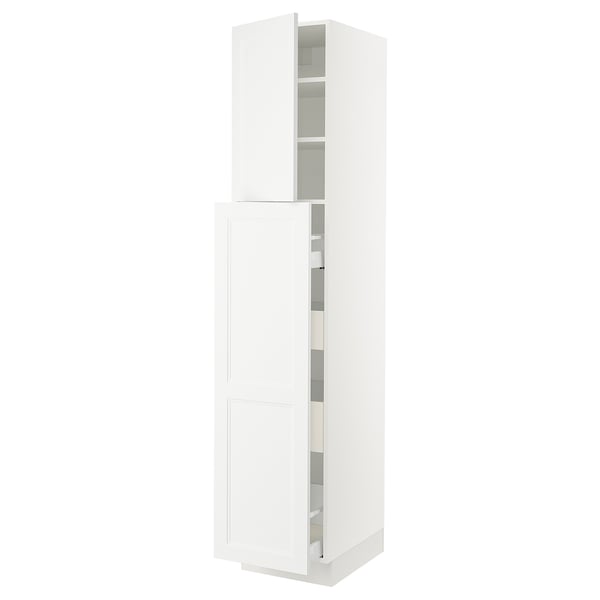 A white tall kitchen cabinet from IKEAs SEKTION system with open doors revealing shelves inside.