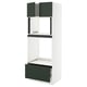 White kitchen cabinet with green drawers and doors, modern design.