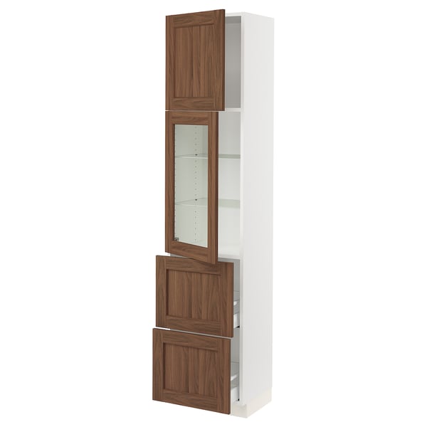 Ikea SEKTION white kitchen cabinet with walnut doors, glass, and adjustable shelves.