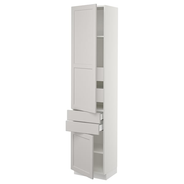 A white SEKTION kitchen cabinet with a traditional design, including doors, drawers, and adjustable shelves.