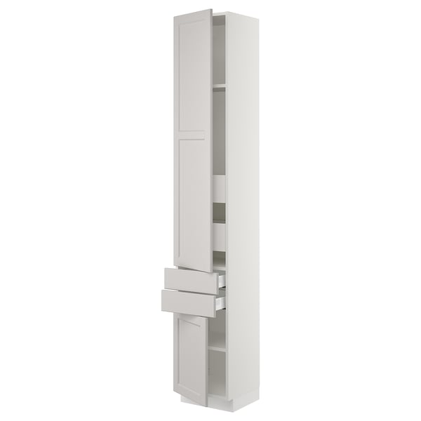 White SEKTION kitchen cabinet in light grey with doors and drawers, slim and tall.